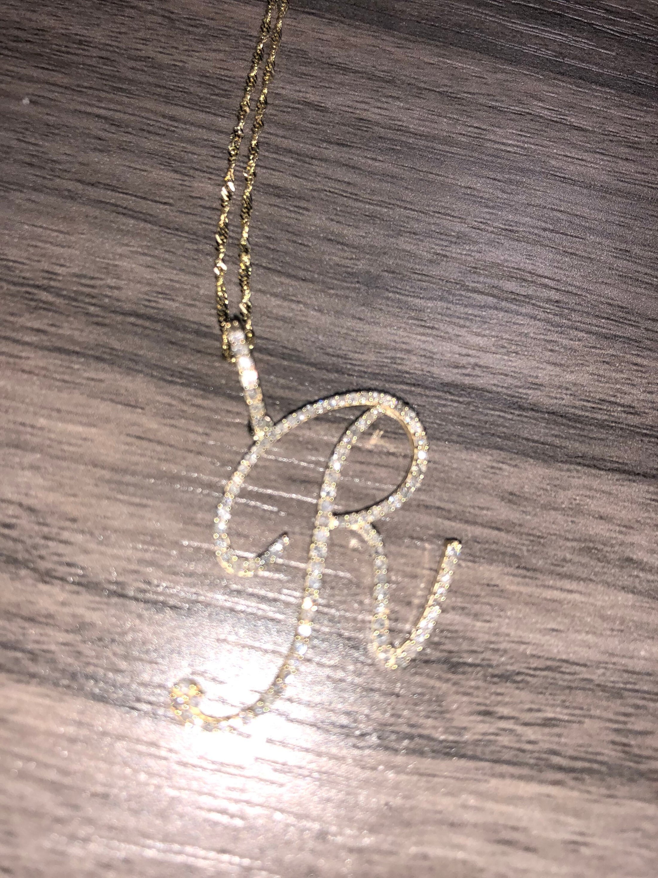 Gold initial